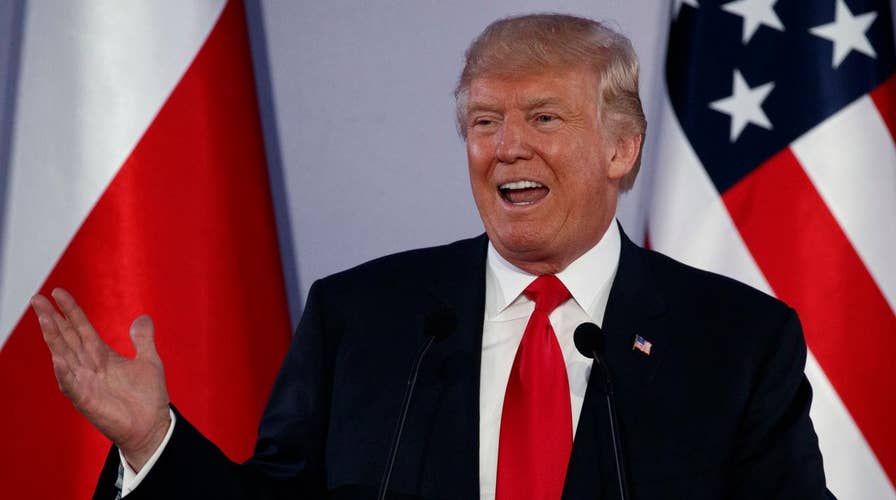 President rips media on foreign soil