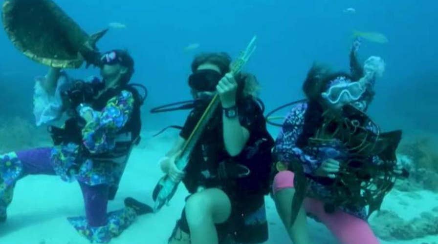 Divers hold underwater music festival in Florida Keys