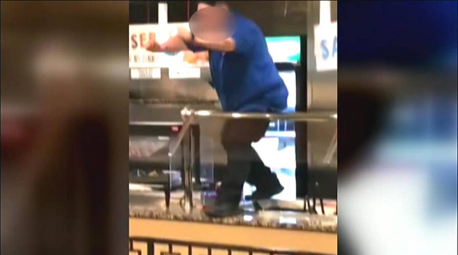 Restaurant workers gone wild: Manager dances on buffet bar