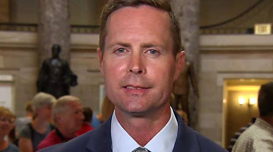 Davis: I'd be glad to come back in August to cast a vote