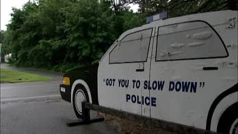 Man puts life-sized cutout of police cruiser to slow down drivers