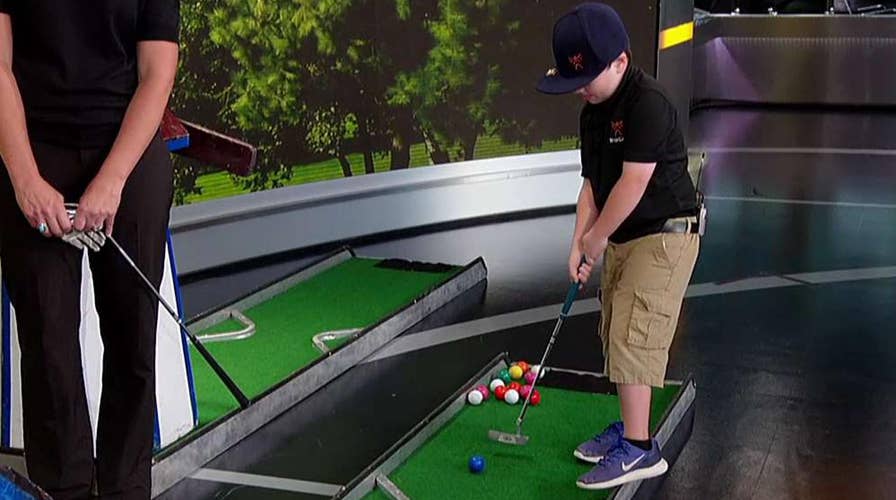 6-year-old golf prodigy shows off his putting skills