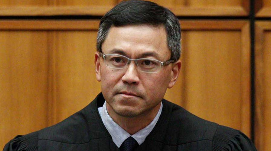 Hawaii judge expands travel ban exemptions