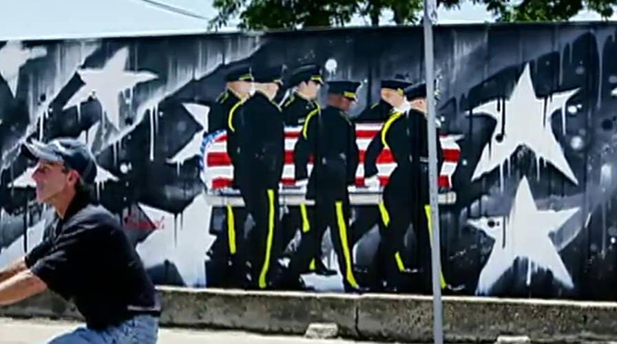 Business owner fights to keep mural to slain Dallas cops