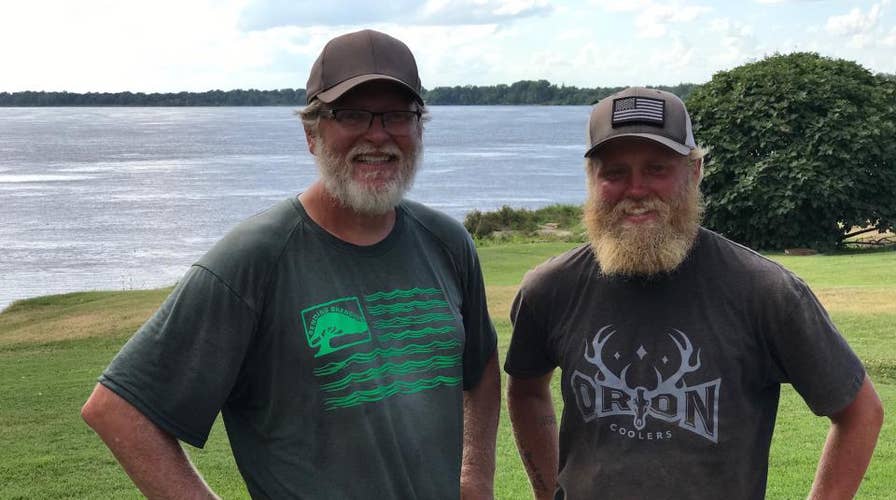 Father and son kayak Mississippi River for vets