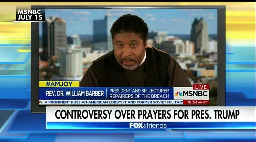 Lawrence Jones reacts to criticism of Trump prayer photo.