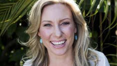 Body cam footage shows officers attempting to save Justine Damond after she was shot by officer
