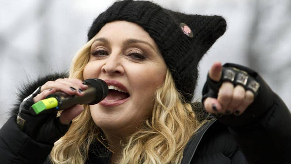 Madonna debuts curvy derrière; fans wonder if implants are involved