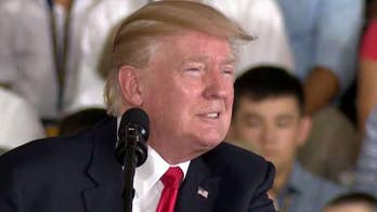 Trump attends commissioning of USS Ford, makes Obamacare overhaul plea