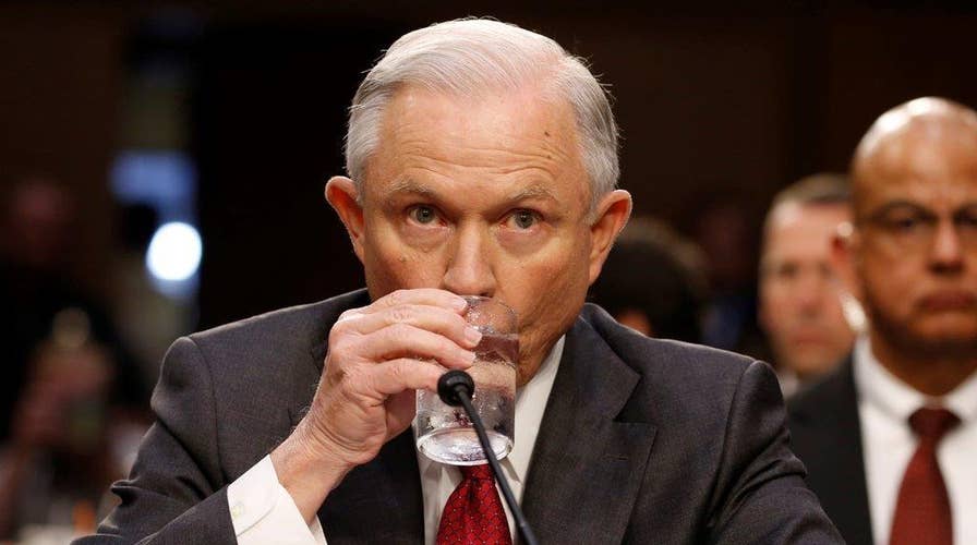 Attorney General Sessions stays put amid Trump attacks