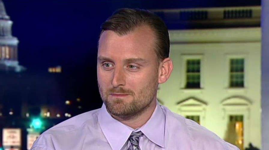 Tucker headlocks 'The Progressive Liberal'