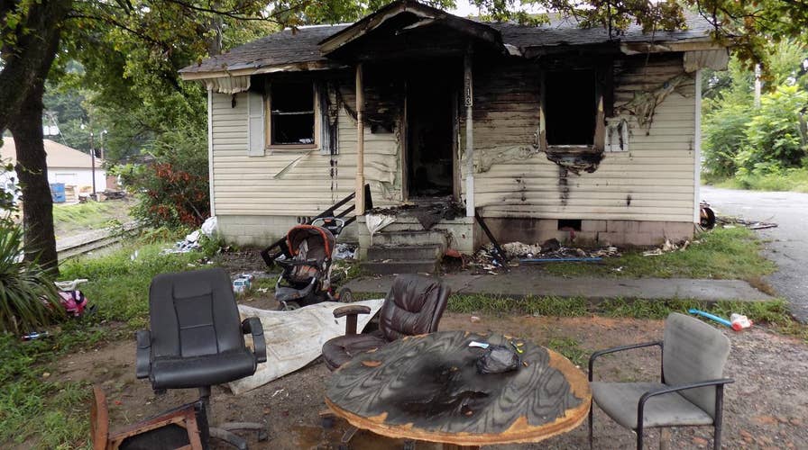 Arkansas man dies in house fire trying to save children