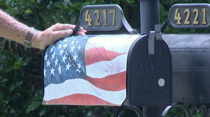 Veteran banned from putting American flag on mailbox