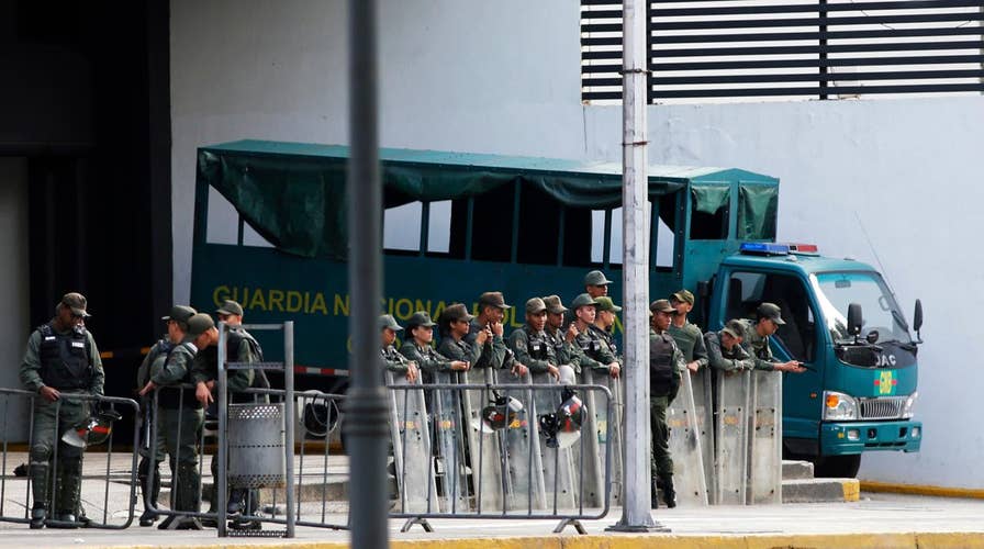 Venezuela security troops seize chief prosecutor's office 