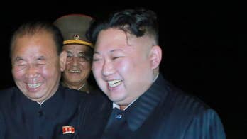 North Korea, Trump ratchet up tension with threats of 'fire' hours apart