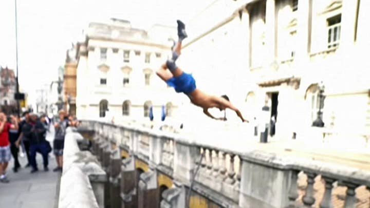 Daredevil somersaults over London's Somerset House gap