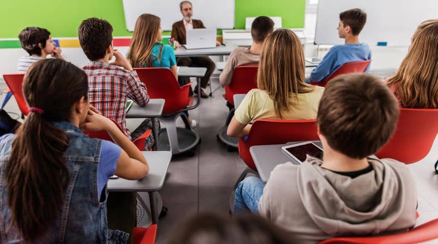 Virginia high school to choose honors students by skin color