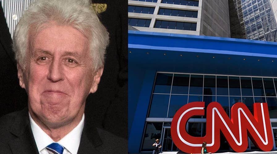 Jeffrey Lord fired from CNN over Nazi slogan