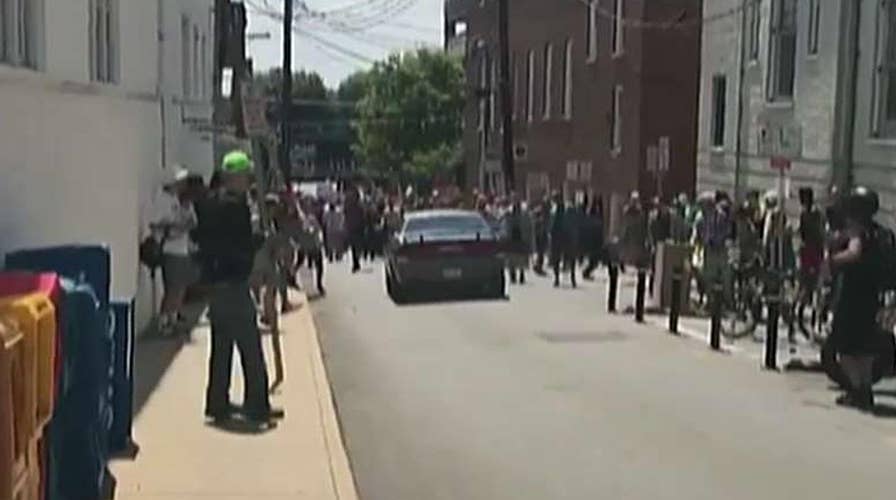 Video shows car crashing into Charlottesville protest