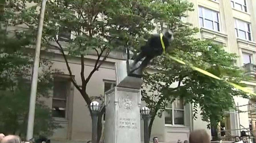 Protesters topple confederate statue in Durham, NC