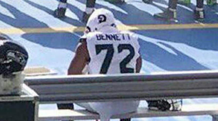 Seattle Seahawks' Michael Bennett sits out national anthem
