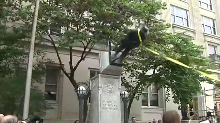Protesters topple confederate statue in Durham, NC