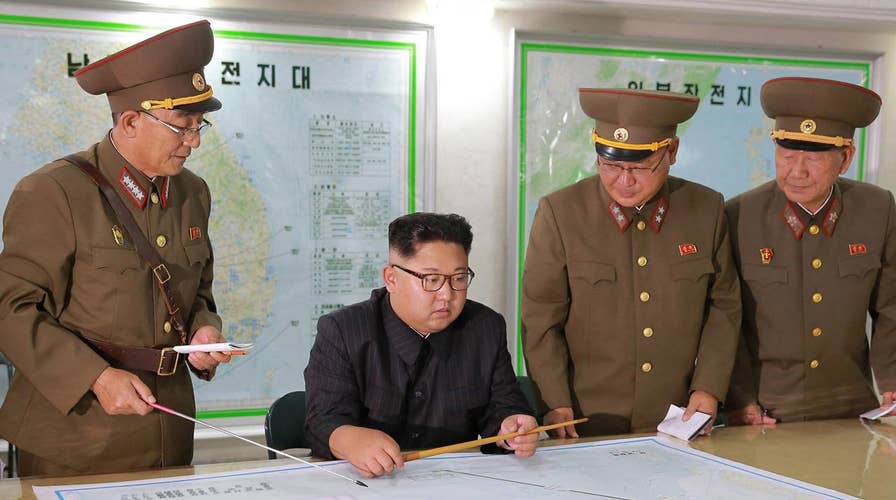 China urges US, North Korea to 'hit the brakes' on threats