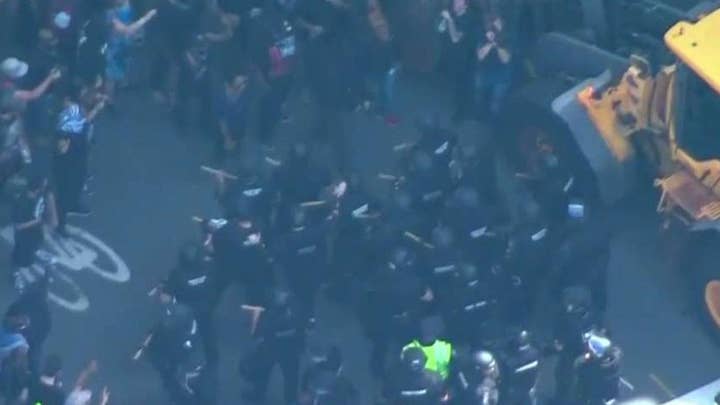 Protesters and police clash in Boston