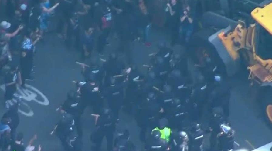Protesters and police clash in Boston