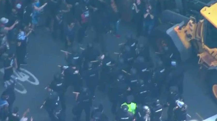 Protesters and police clash in Boston