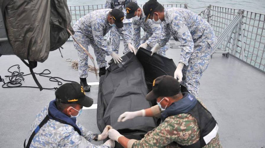 Divers discover remains of Navy sailors on USS McCain