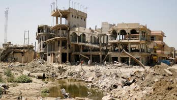 The struggle to recover and identify the dead in Mosul after ISIS