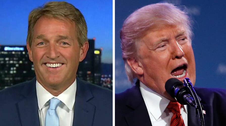Sen. Jeff Flake reacts to criticism from President Trump