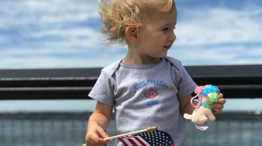 ACLU attacked online over photo of white baby with US flag