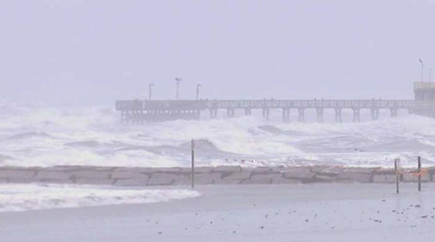 Waves pound Texas coast as Harvey gains strength
