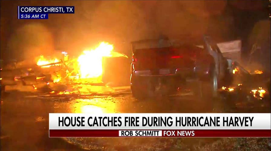 Harvey fire melts cars