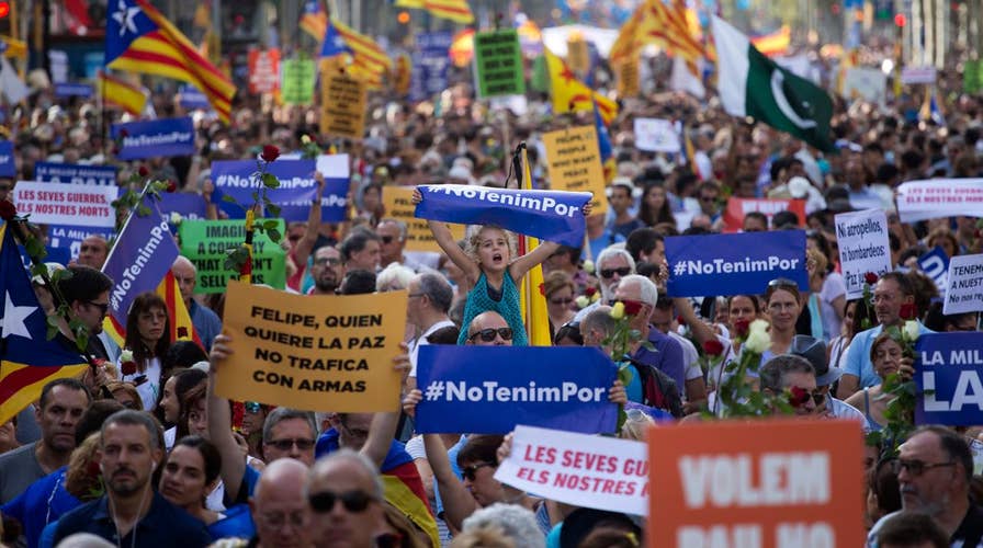 Thousands in Barcelona honor victims of terror attacks