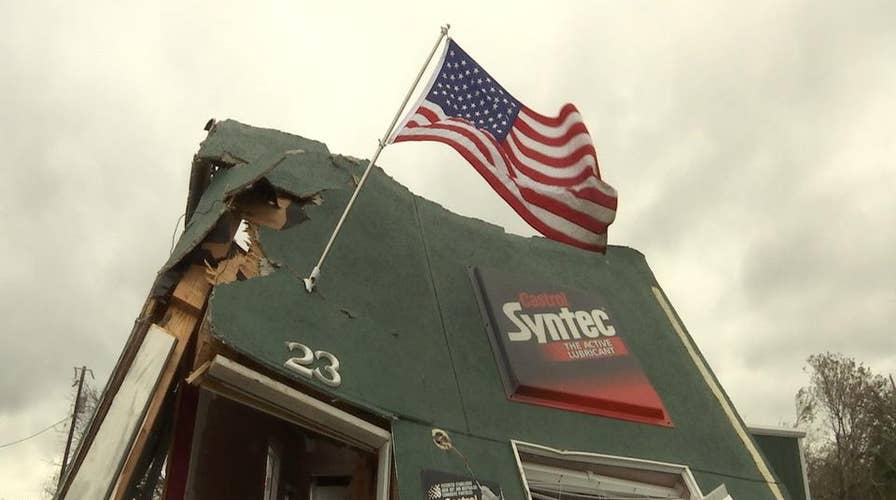 Texas residents hang flag as sign of determination