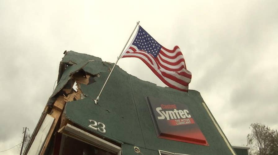 Texas residents hang flag as sign of determination
