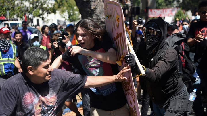Antifa members attack peaceful right-wing demonstrators