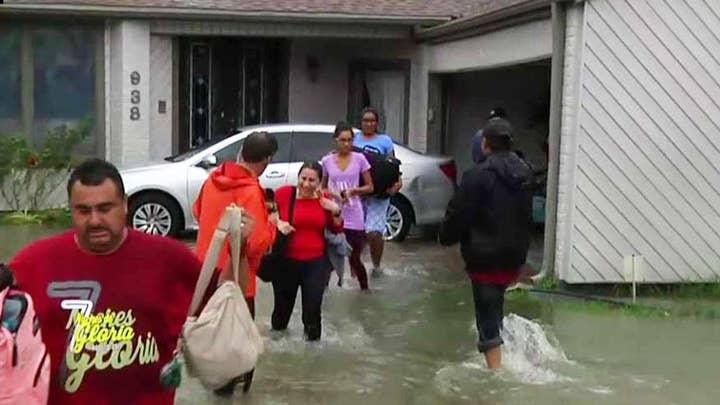 Overflow from Houston reservoir forces families to evacuate