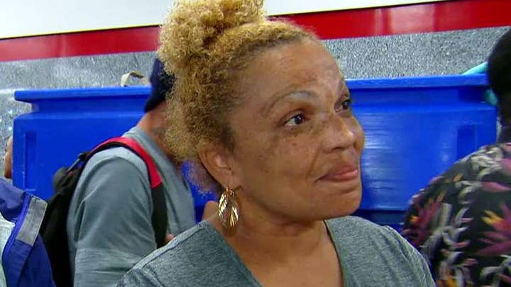 Evacuees find relief, comfort at Houston convention center