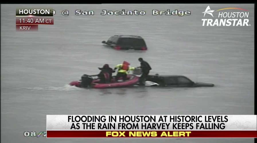 People rescued from floodwaters in dramatic video