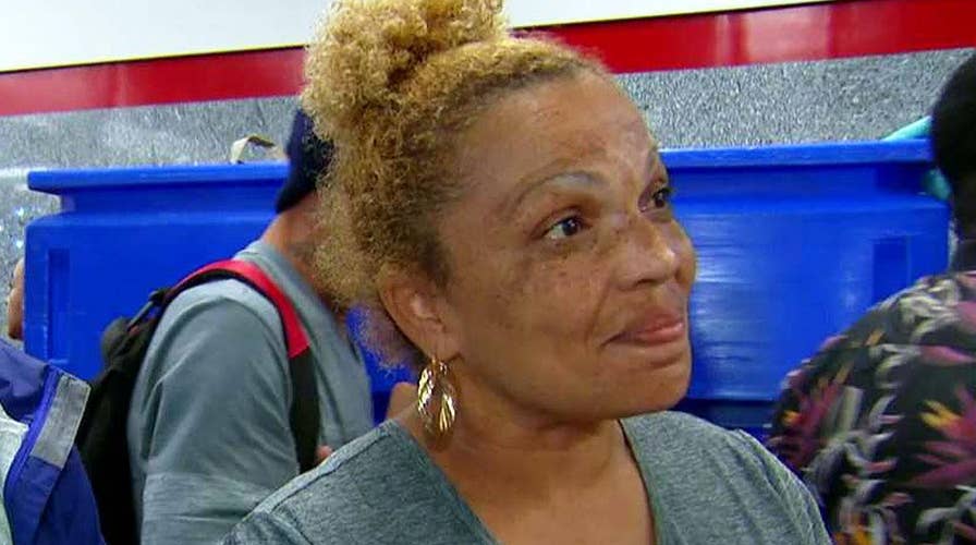 Evacuees find relief, comfort at Houston convention center