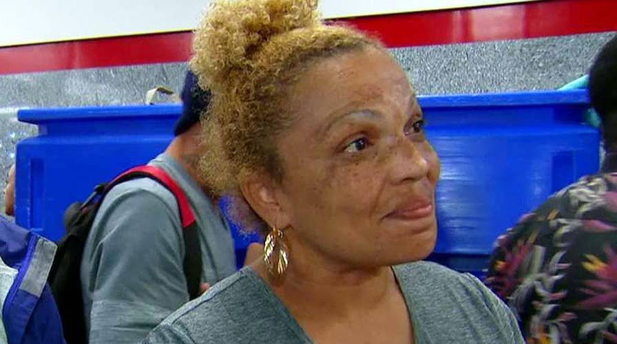 Evacuees find relief, comfort at Houston convention center