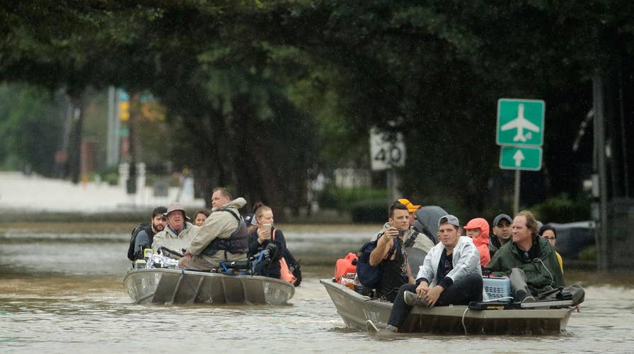 Thousands rescued in Houston as floodwaters rise