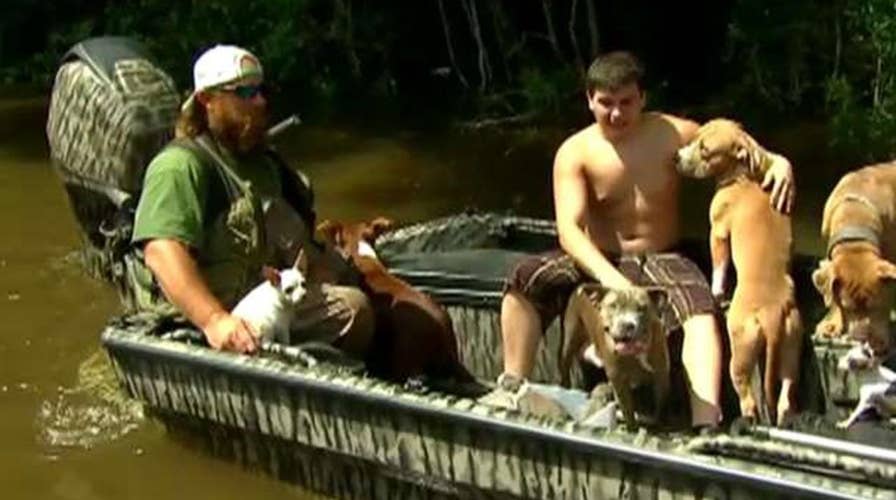 Harvey victims look to salvage items from flooded homes