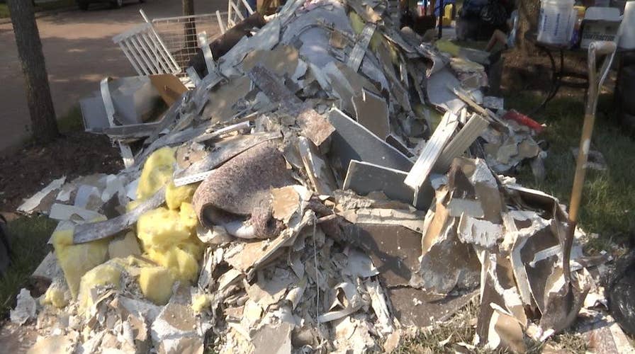 Houston area residents clean out flooded homes after Harvey