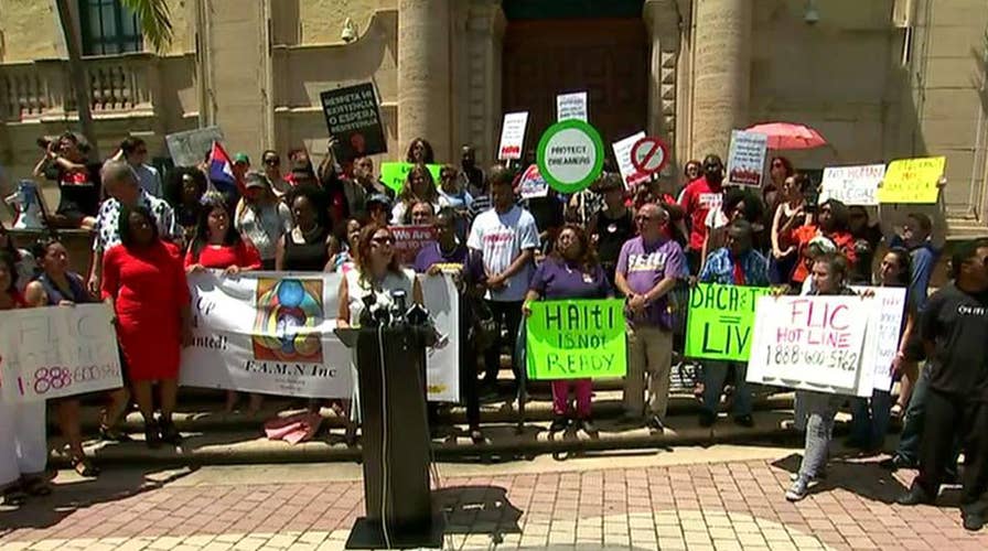 Activists protest President Trump's decision to end DACA
