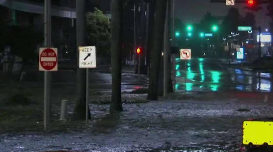 Miami begins to see flooding, tropical storm winds